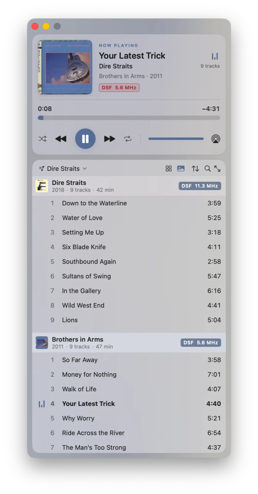 Vano Audio Player compact window showing cover art, transport controls and an album-grouped playlist